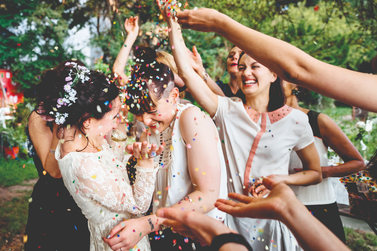 bride and bride with confetti.